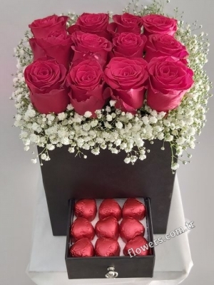 Red Roses And Heart-shaped Chocolates